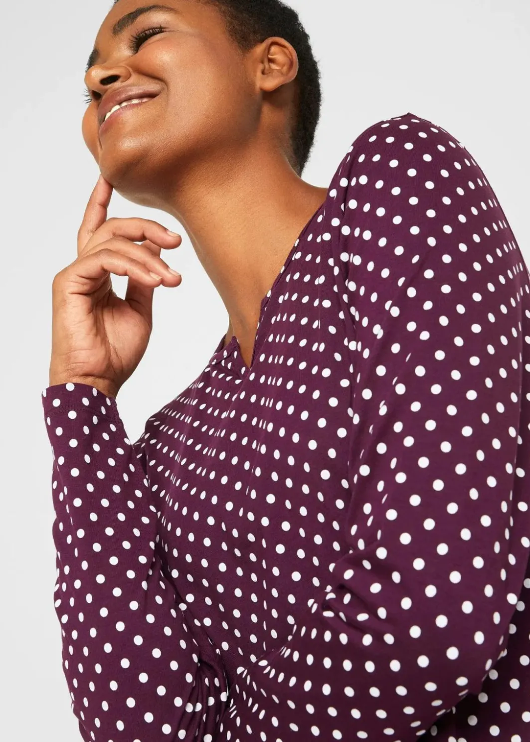 Online Gepunktetes Baumwoll-Langarmshirt mit Seitenschlitzen Damen Shirts & Tops